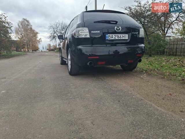 Мазда СХ-7 2007 в Кропивницком (Кировограде) на Automoto.ua Синий Мазда СХ-7, объемом двигателя 2.26 л и пробегом 207 тыс. км за 7000 $, фото 34 на Automoto.ua