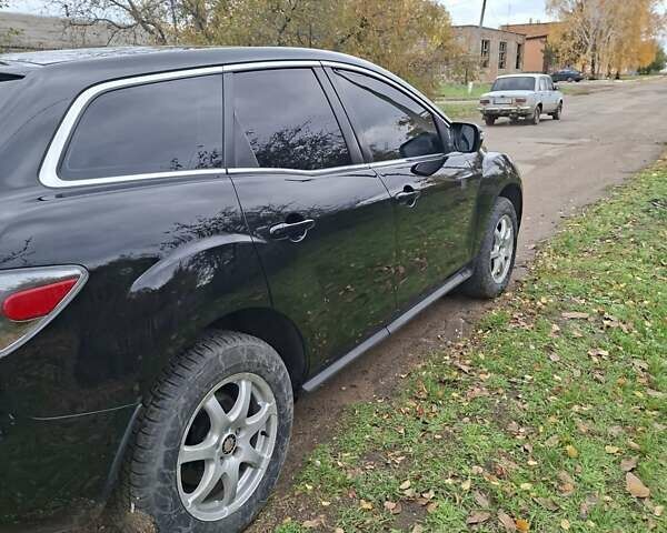 Мазда СХ-7 2007 в Кропивницком (Кировограде) на Automoto.ua Синий Мазда СХ-7, объемом двигателя 2.26 л и пробегом 207 тыс. км за 7000 $, фото 158 на Automoto.ua