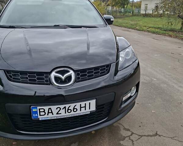 Мазда СХ-7 2007 в Кропивницком (Кировограде) на Automoto.ua Синий Мазда СХ-7, объемом двигателя 2.26 л и пробегом 207 тыс. км за 7000 $, фото 145 на Automoto.ua
