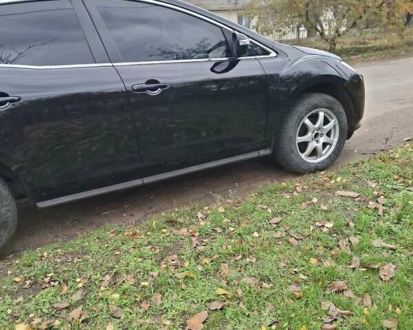 Мазда СХ-7 2007 в Кропивницком (Кировограде) на Automoto.ua Синий Мазда СХ-7, объемом двигателя 2.26 л и пробегом 207 тыс. км за 7000 $, фото 163 на Automoto.ua