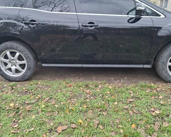 Мазда СХ-7 2007 в Кропивницком (Кировограде) на Automoto.ua Синий Мазда СХ-7, объемом двигателя 2.26 л и пробегом 207 тыс. км за 7000 $, фото 162 на Automoto.ua