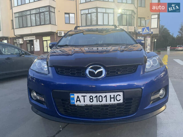 Синий Мазда СХ-7, объемом двигателя 2.26 л и пробегом 150 тыс. км за 7800 $, фото 35 на Automoto.ua