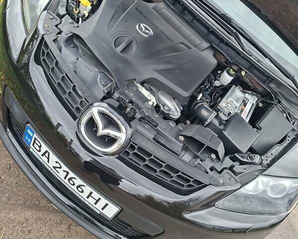 Мазда СХ-7 2007 в Кропивницком (Кировограде) на Automoto.ua Синий Мазда СХ-7, объемом двигателя 2.26 л и пробегом 207 тыс. км за 7000 $, фото 196 на Automoto.ua