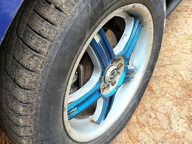 Синий Мазда СХ-7, объемом двигателя 2.3 л и пробегом 223 тыс. км за 6250 $, фото 12 на Automoto.ua