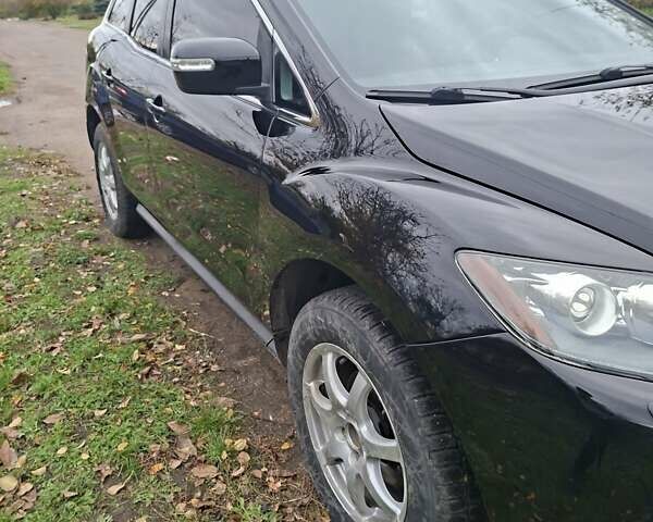 Мазда СХ-7 2007 в Кропивницком (Кировограде) на Automoto.ua Синий Мазда СХ-7, объемом двигателя 2.26 л и пробегом 207 тыс. км за 7000 $, фото 107 на Automoto.ua