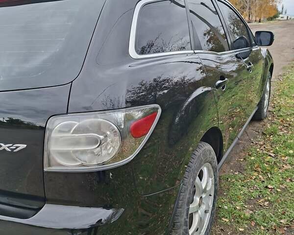 Мазда СХ-7 2007 в Кропивницком (Кировограде) на Automoto.ua Синий Мазда СХ-7, объемом двигателя 2.26 л и пробегом 207 тыс. км за 7000 $, фото 102 на Automoto.ua