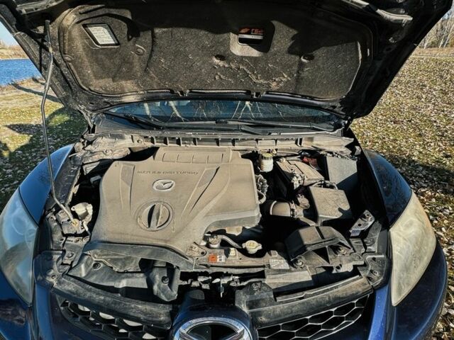 Синий Мазда СХ-7, объемом двигателя 2.3 л и пробегом 188 тыс. км за 7800 $, фото 7 на Automoto.ua