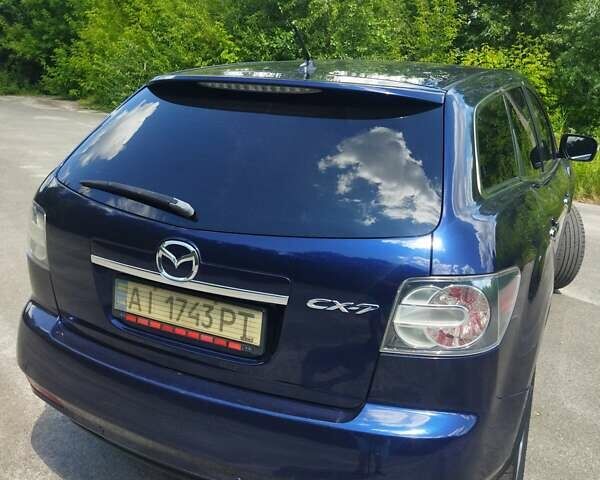 Синій Мазда СХ-7, об'ємом двигуна 2.2 л та пробігом 232 тис. км за 10700 $, фото 33 на Automoto.ua