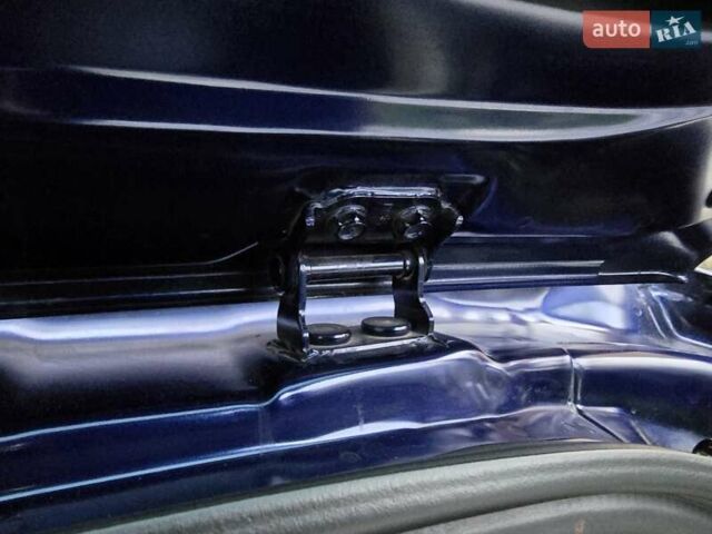 Синий Мазда СХ-7, объемом двигателя 2.18 л и пробегом 246 тыс. км за 9750 $, фото 58 на Automoto.ua