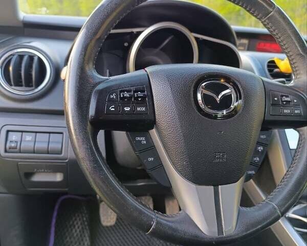 Синий Мазда СХ-7, объемом двигателя 2.18 л и пробегом 148 тыс. км за 11300 $, фото 16 на Automoto.ua