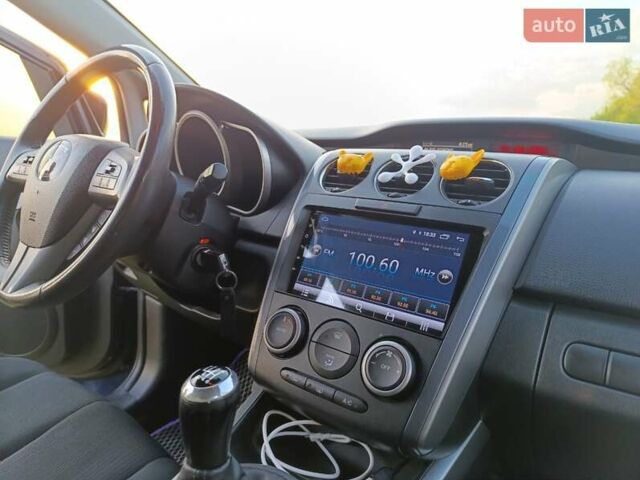 Синий Мазда СХ-7, объемом двигателя 2.18 л и пробегом 148 тыс. км за 11300 $, фото 15 на Automoto.ua