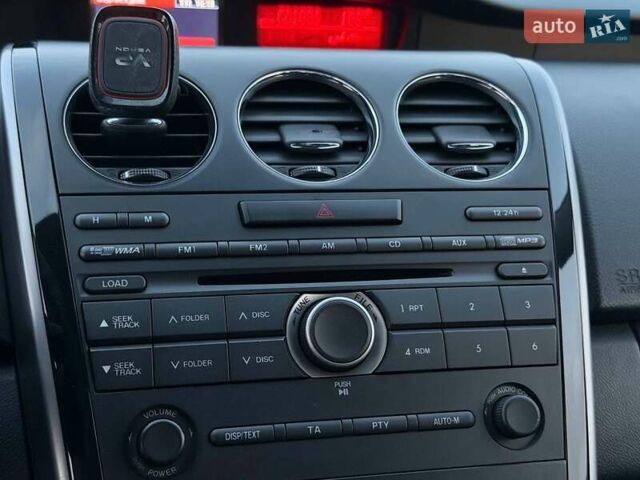 Синій Мазда СХ-7, об'ємом двигуна 2.26 л та пробігом 135 тис. км за 10500 $, фото 30 на Automoto.ua