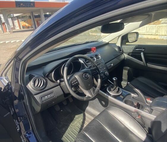 Синий Мазда СХ-7, объемом двигателя 2.2 л и пробегом 163 тыс. км за 9000 $, фото 6 на Automoto.ua