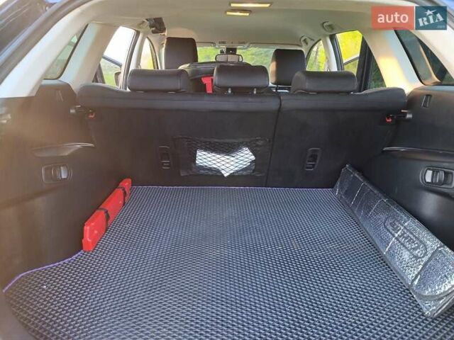 Синий Мазда СХ-7, объемом двигателя 2.18 л и пробегом 148 тыс. км за 11300 $, фото 6 на Automoto.ua