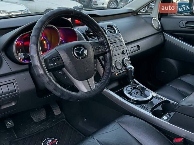 Синій Мазда СХ-7, об'ємом двигуна 2.26 л та пробігом 135 тис. км за 10500 $, фото 20 на Automoto.ua