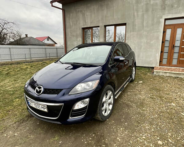 Синий Мазда СХ-7, объемом двигателя 2.18 л и пробегом 200 тыс. км за 10000 $, фото 12 на Automoto.ua