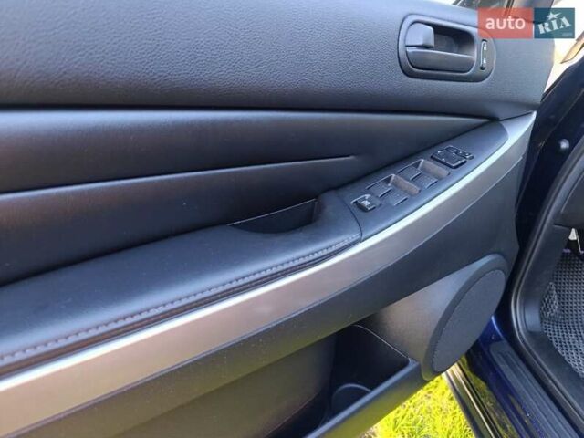 Синий Мазда СХ-7, объемом двигателя 2.18 л и пробегом 148 тыс. км за 11300 $, фото 12 на Automoto.ua