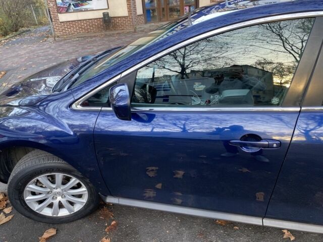 Синий Мазда СХ-7, объемом двигателя 2.5 л и пробегом 274 тыс. км за 9200 $, фото 1 на Automoto.ua