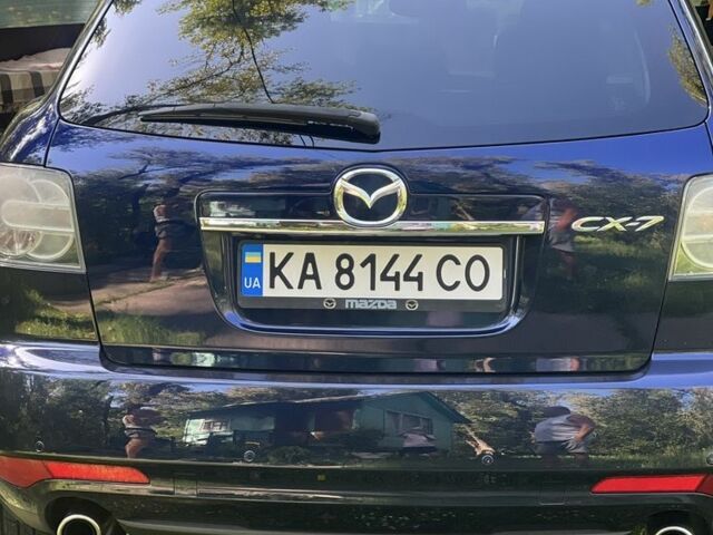 Синий Мазда СХ-7, объемом двигателя 2.3 л и пробегом 135 тыс. км за 12700 $, фото 16 на Automoto.ua