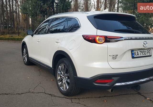 Білий Мазда СХ-9, об'ємом двигуна 2.49 л та пробігом 104 тис. км за 32000 $, фото 5 на Automoto.ua