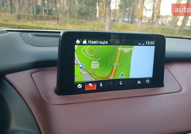 Білий Мазда СХ-9, об'ємом двигуна 2.49 л та пробігом 104 тис. км за 32000 $, фото 10 на Automoto.ua