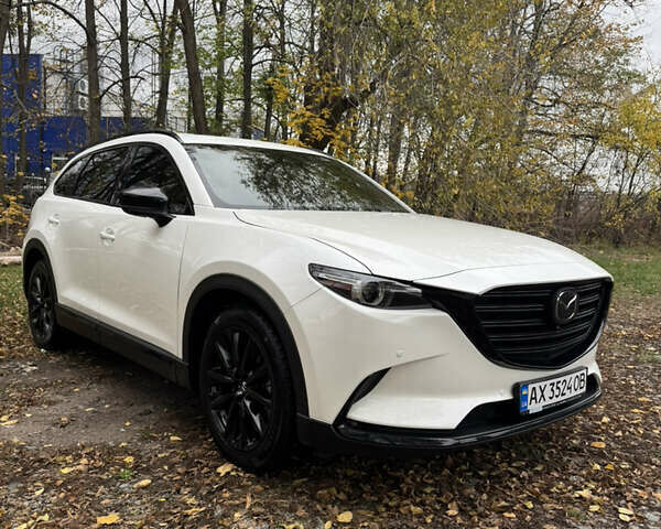 Белый Мазда СХ-9, объемом двигателя 2.49 л и пробегом 79 тыс. км за 32000 $, фото 1 на Automoto.ua