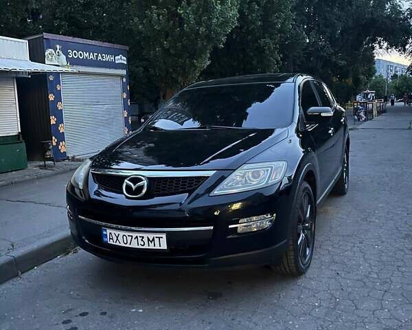 Черный Мазда СХ-9, объемом двигателя 3.5 л и пробегом 242 тыс. км за 8500 $, фото 1 на Automoto.ua