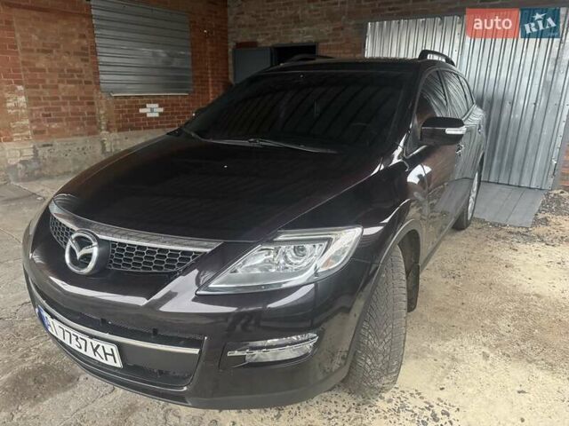 Черный Мазда СХ-9, объемом двигателя 3.7 л и пробегом 250 тыс. км за 8500 $, фото 2 на Automoto.ua