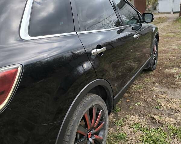 Черный Мазда СХ-9, объемом двигателя 3.7 л и пробегом 260 тыс. км за 9500 $, фото 4 на Automoto.ua