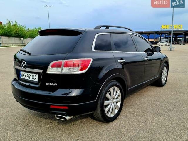 Черный Мазда СХ-9, объемом двигателя 3.7 л и пробегом 199 тыс. км за 12500 $, фото 4 на Automoto.ua