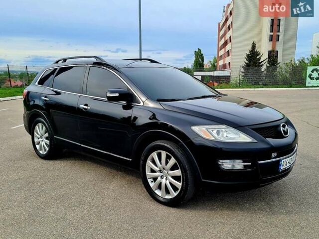 Черный Мазда СХ-9, объемом двигателя 3.7 л и пробегом 199 тыс. км за 12500 $, фото 1 на Automoto.ua