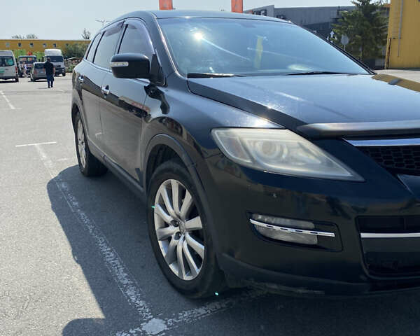 Черный Мазда СХ-9, объемом двигателя 3.73 л и пробегом 145 тыс. км за 10700 $, фото 1 на Automoto.ua