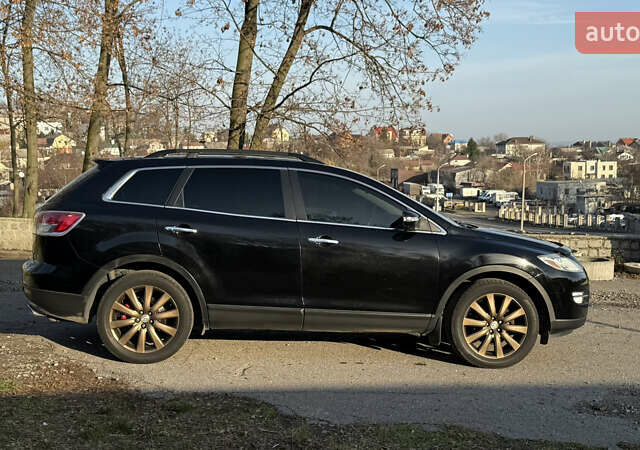 Чорний Мазда СХ-9, об'ємом двигуна 3.73 л та пробігом 288 тис. км за 7600 $, фото 6 на Automoto.ua