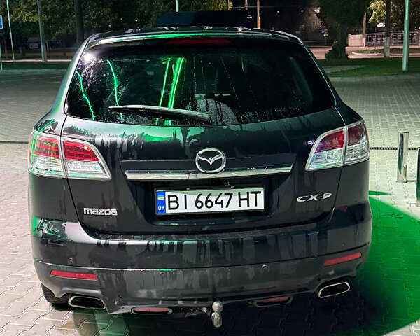 Черный Мазда СХ-9, объемом двигателя 3.73 л и пробегом 306 тыс. км за 7500 $, фото 7 на Automoto.ua