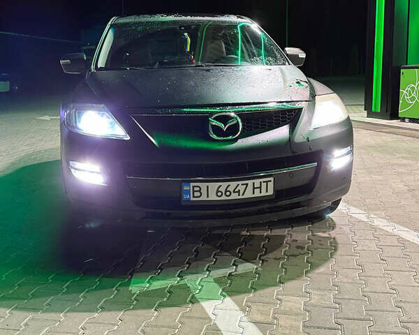 Черный Мазда СХ-9, объемом двигателя 3.73 л и пробегом 306 тыс. км за 7500 $, фото 1 на Automoto.ua