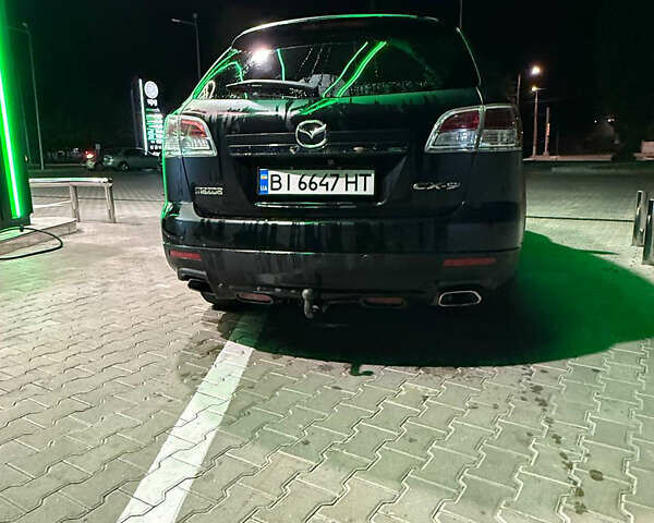 Черный Мазда СХ-9, объемом двигателя 3.73 л и пробегом 306 тыс. км за 7500 $, фото 6 на Automoto.ua
