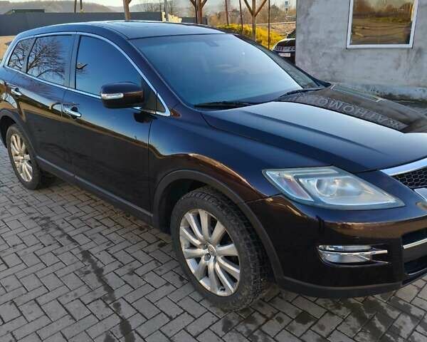 Черный Мазда СХ-9, объемом двигателя 3.73 л и пробегом 220 тыс. км за 11500 $, фото 1 на Automoto.ua