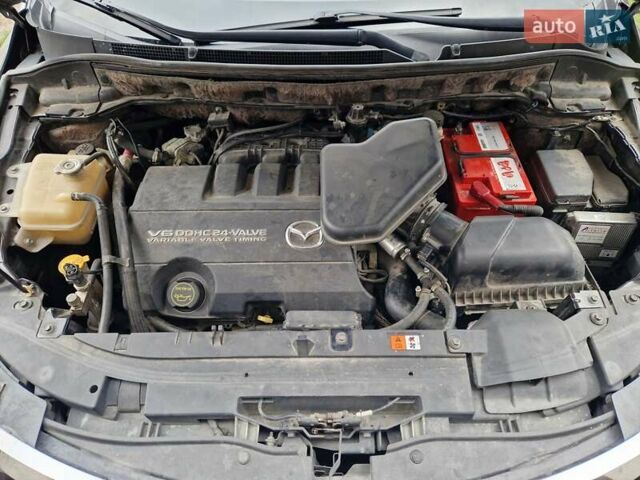 Черный Мазда СХ-9, объемом двигателя 3.73 л и пробегом 312 тыс. км за 7000 $, фото 2 на Automoto.ua