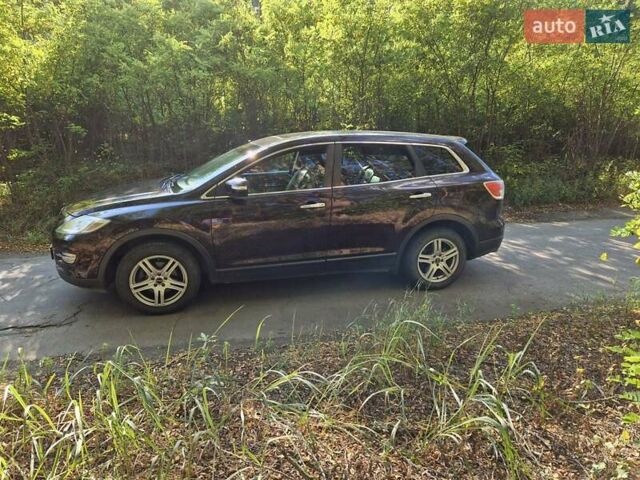 Черный Мазда СХ-9, объемом двигателя 3.73 л и пробегом 312 тыс. км за 7000 $, фото 6 на Automoto.ua