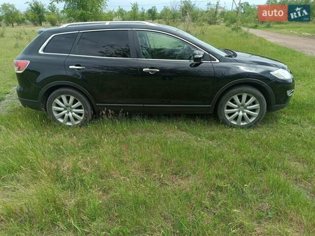 Чорний Мазда СХ-9, об'ємом двигуна 3.73 л та пробігом 200 тис. км за 10700 $, фото 4 на Automoto.ua