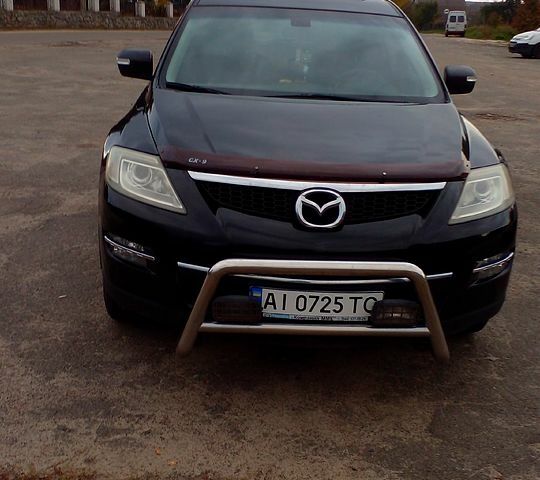 Черный Мазда СХ-9, объемом двигателя 3.7 л и пробегом 400 тыс. км за 8500 $, фото 1 на Automoto.ua
