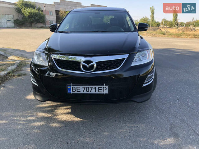 Черный Мазда СХ-9, объемом двигателя 3.7 л и пробегом 187 тыс. км за 11500 $, фото 1 на Automoto.ua