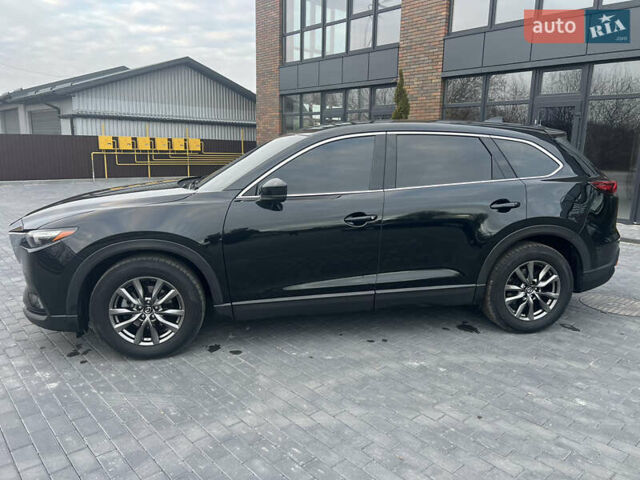 Черный Мазда СХ-9, объемом двигателя 2.49 л и пробегом 143 тыс. км за 18500 $, фото 1 на Automoto.ua