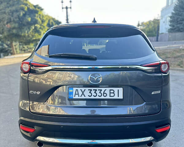 Черный Мазда СХ-9, объемом двигателя 2.49 л и пробегом 106 тыс. км за 23500 $, фото 4 на Automoto.ua