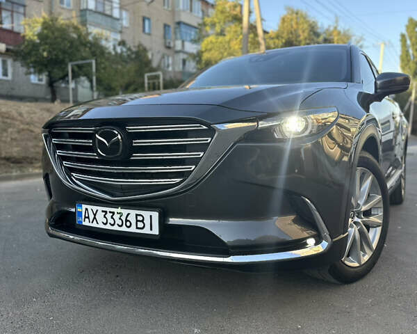 Черный Мазда СХ-9, объемом двигателя 2.49 л и пробегом 106 тыс. км за 23500 $, фото 1 на Automoto.ua