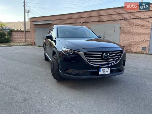 Черный Мазда СХ-9, объемом двигателя 2.49 л и пробегом 76 тыс. км за 29900 $, фото 1 на Automoto.ua