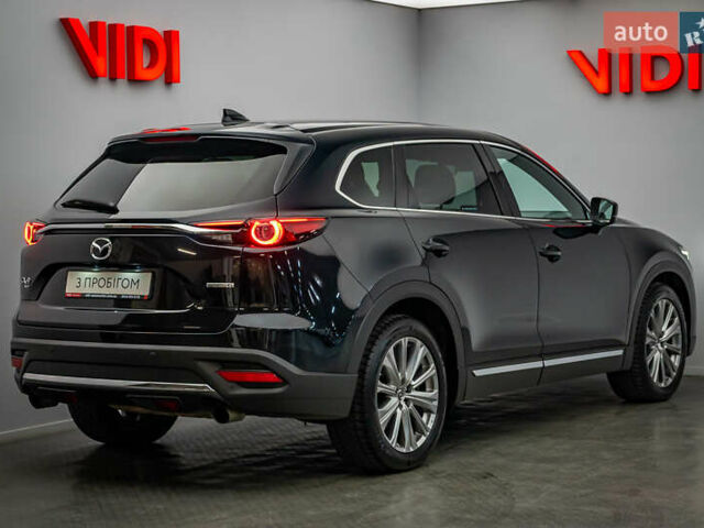 Черный Мазда СХ-9, объемом двигателя 2.5 л и пробегом 113 тыс. км за 33238 $, фото 1 на Automoto.ua