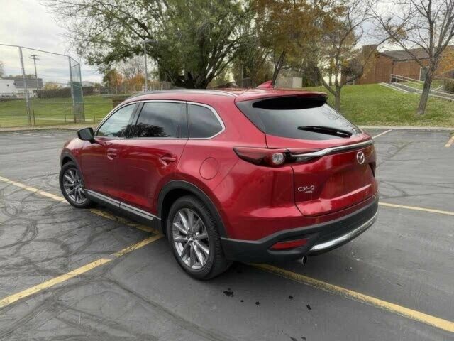 Червоний Мазда СХ-9, об'ємом двигуна 2.5 л та пробігом 28 тис. км за 5600 $, фото 5 на Automoto.ua