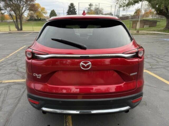 Червоний Мазда СХ-9, об'ємом двигуна 2.5 л та пробігом 28 тис. км за 5600 $, фото 4 на Automoto.ua