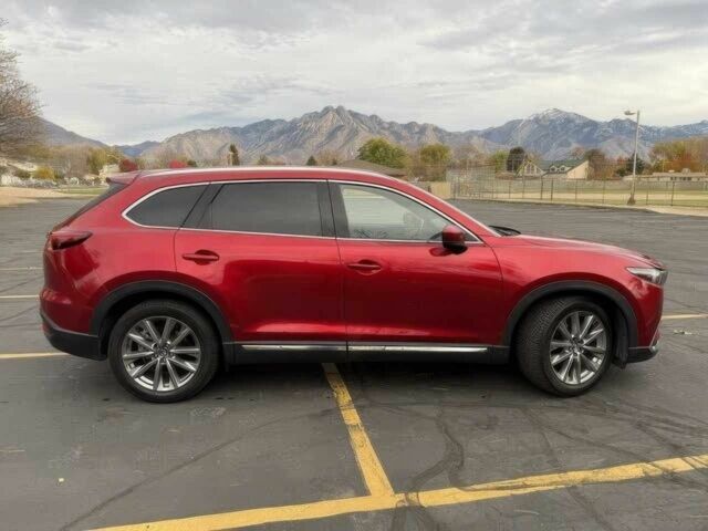 Красный Мазда СХ-9, объемом двигателя 2.5 л и пробегом 21 тыс. км за 20200 $, фото 2 на Automoto.ua